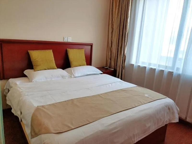 Bed in GreenTree Inn ShangHai South JiangYang Road South ChangJiang Road Express Hotel