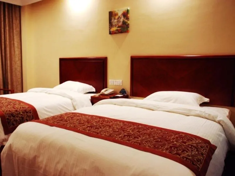 Bed in GreenTree Inn ShanDong WeiFang LinQu ZhanQian Road LuChuan Business Hotel