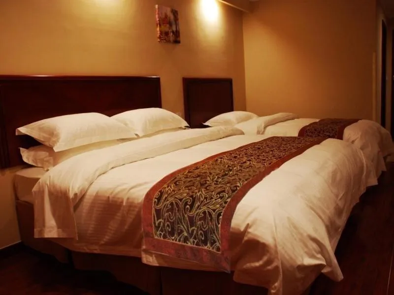 Bed in GreenTree Inn ShanDong WeiFang LinQu ZhanQian Road LuChuan Business Hotel