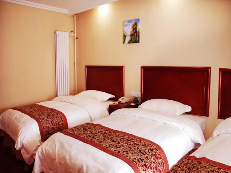 Bed in GreenTree Inn ShanDong WeiFang LinQu ZhanQian Road LuChuan Business Hotel
