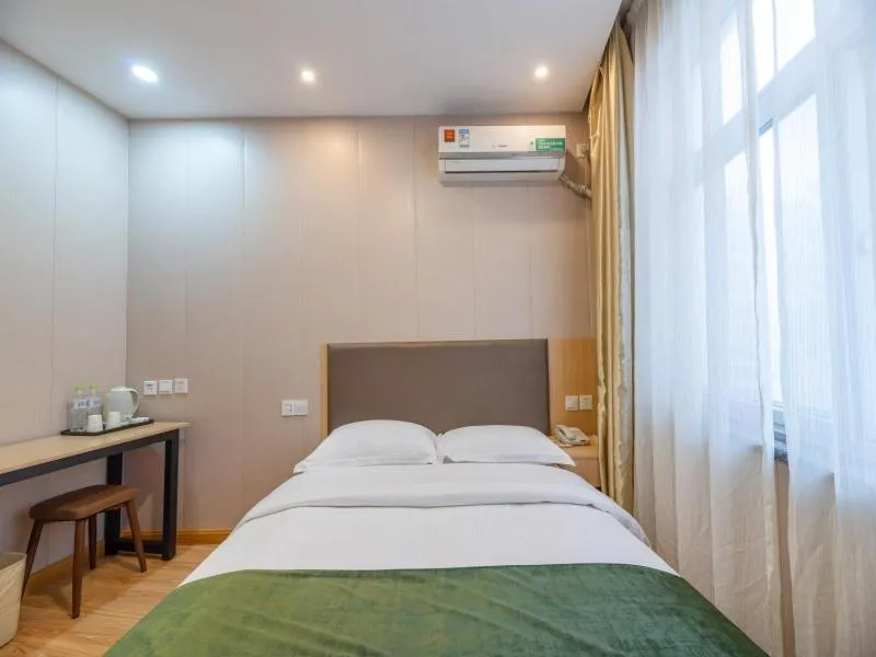 Bed in GreenTree Inn Shandong Jining Railway Station Express Hotel
