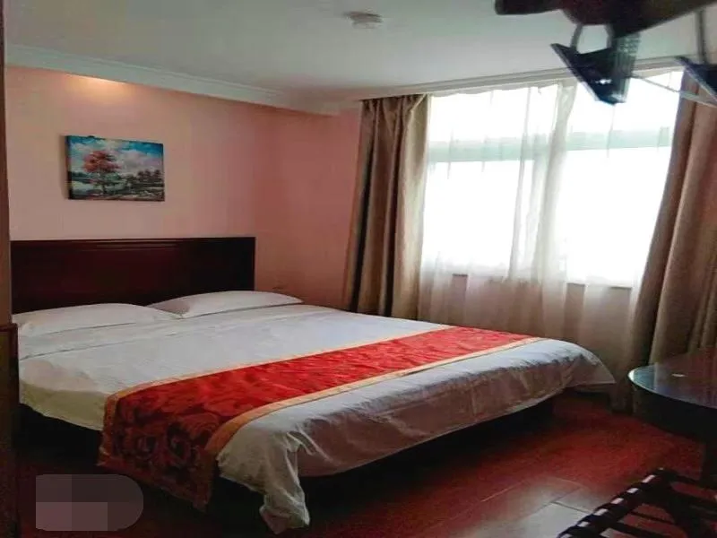 Bed in GreenTree Inn Shandong Jining Zoucheng South Yishan Road Experimental Middle School Express Hotel