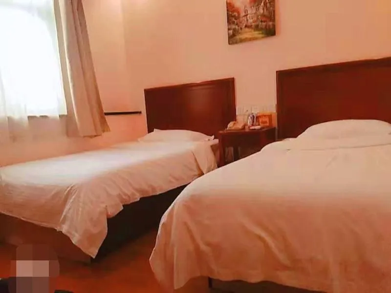 Bed in GreenTree Inn Shandong Jining Zoucheng South Yishan Road Experimental Middle School Express Hotel