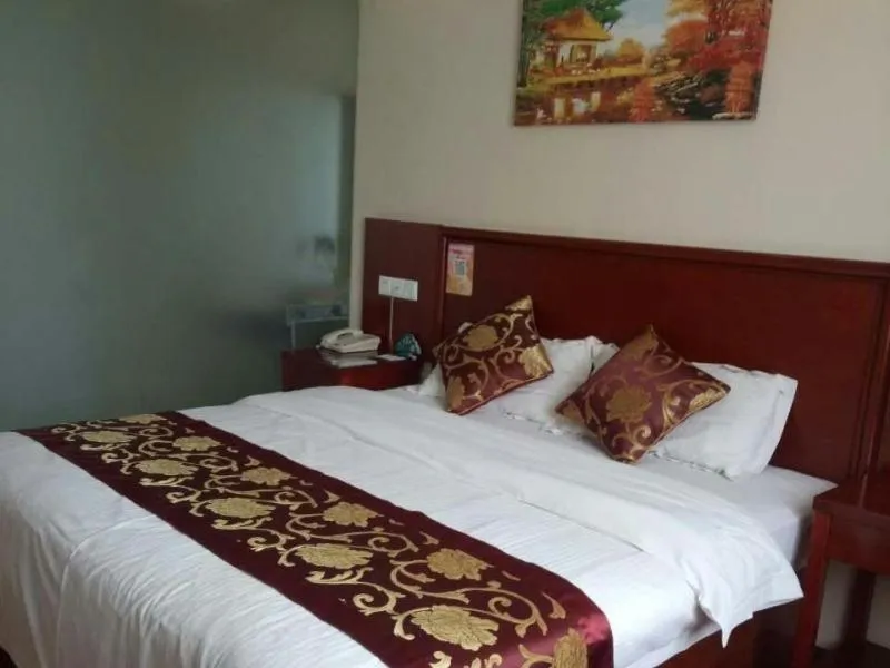 Bed in GreenTree Inn Anhui Bozhou Mengcheng Zhuangzi Road Express Hotel