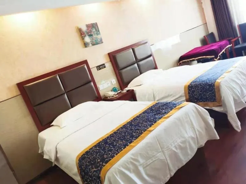 Bed in GreenTree Inn Anhui Bozhou Agricultural Trade City Express Hotel