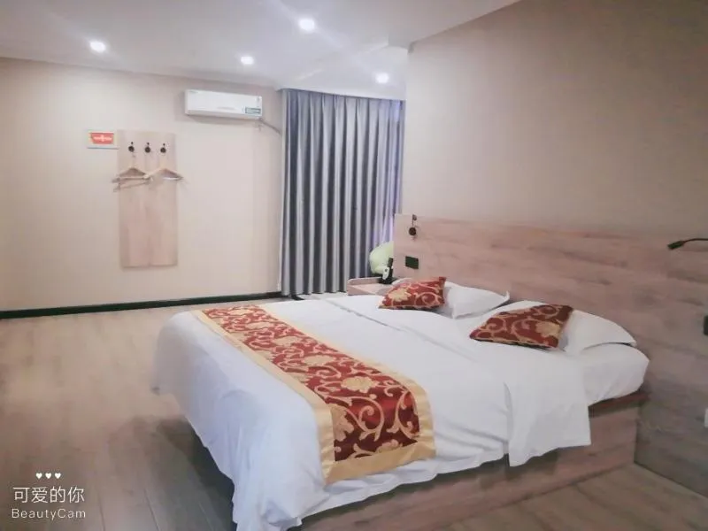 Bed in GreenTree Inn ShanDong ZaoZhuang TengZhou FuQian Road LongQuan Square Business Hotel