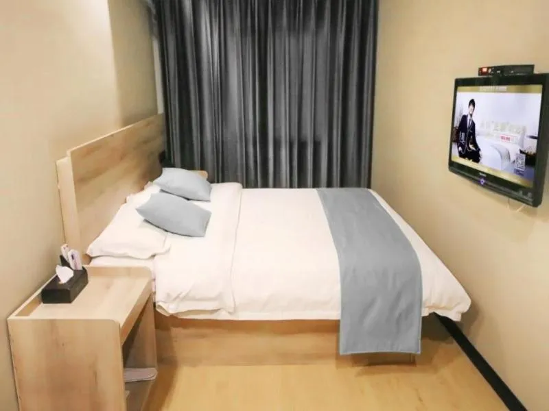 Bed in GreenTree Inn ShanDong ZaoZhuang TengZhou FuQian Road LongQuan Square Business Hotel