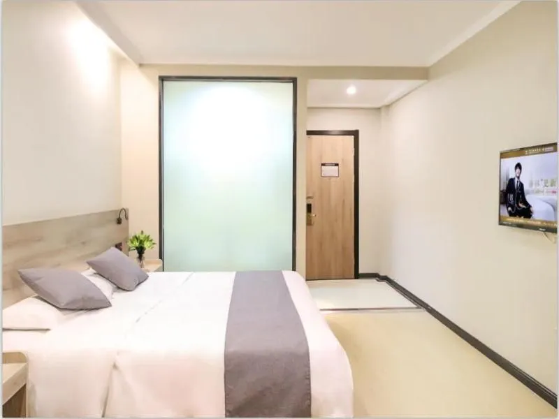 Bed in GreenTree Inn ShanDong ZaoZhuang TengZhou FuQian Road LongQuan Square Business Hotel
