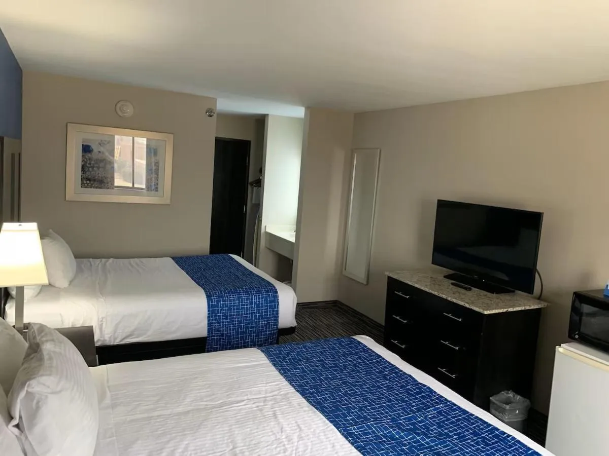 Bed in Baymont Inn & Suites