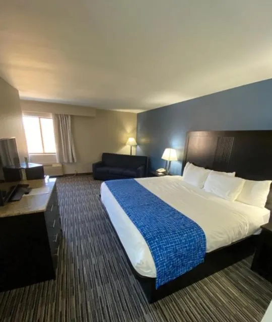 Bed in Baymont Inn & Suites