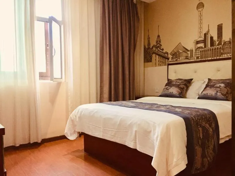 Bed in GreenTree Inn Guangxi Yulin Jincheng Commercial Building Shell Hotel