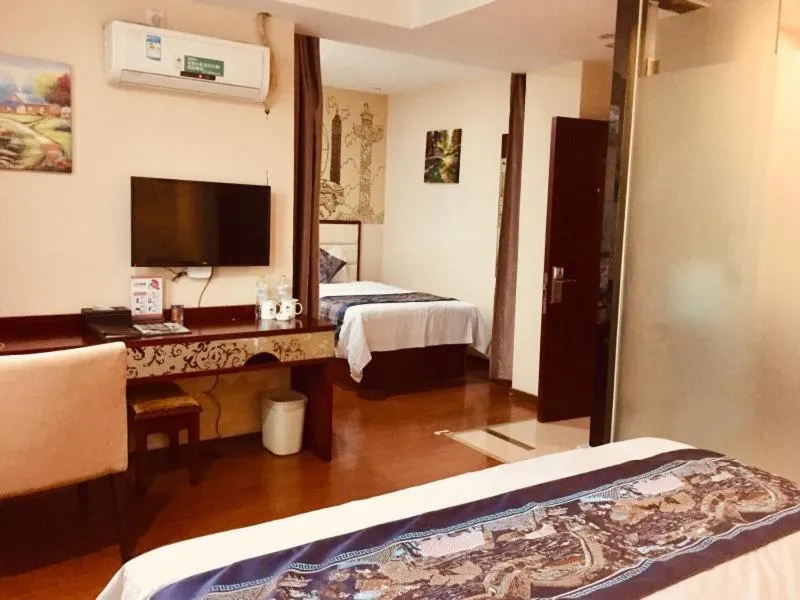 Bed in GreenTree Inn Guangxi Yulin Jincheng Commercial Building Shell Hotel