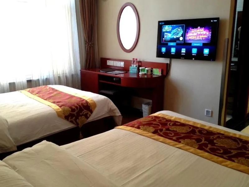 Bed in GreenTree Inn Xinjiang Bole Wanxianghui Express Hotel