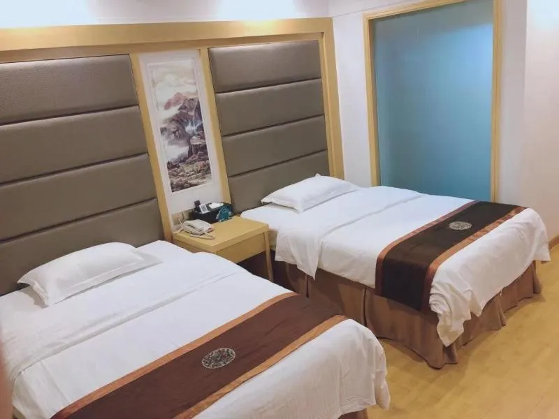 Bed in GreenTree Inn AnHui HuangShan She County HuiZhou Ancient City Middle HuangShan Road Business Hotel