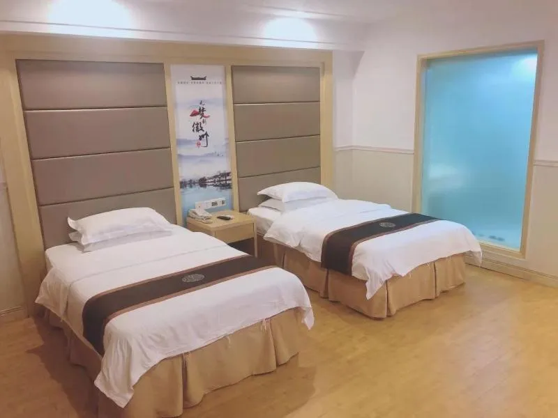 Bed in GreenTree Inn AnHui HuangShan She County HuiZhou Ancient City Middle HuangShan Road Business Hotel