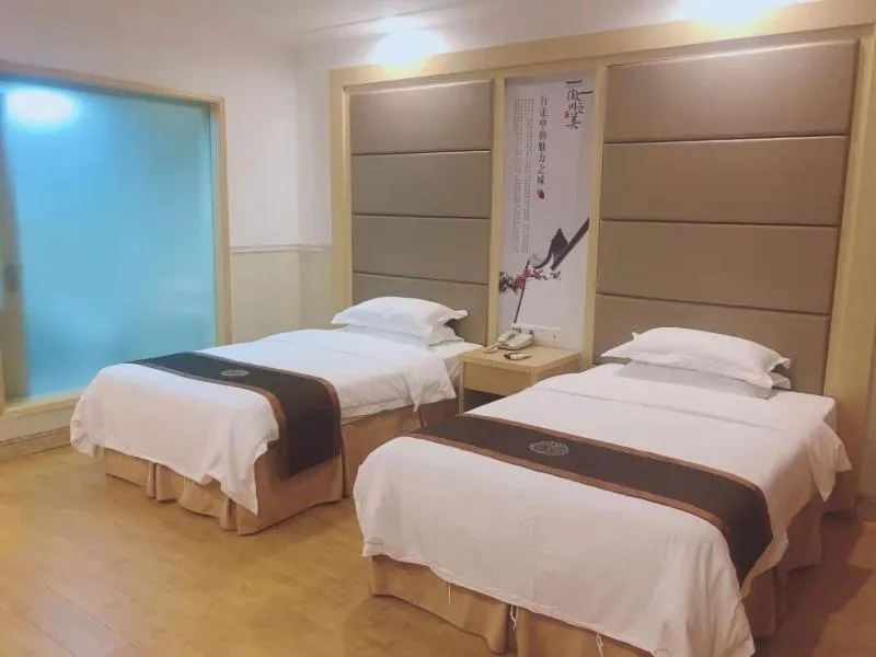 Bed in GreenTree Inn AnHui HuangShan She County HuiZhou Ancient City Middle HuangShan Road Business Hotel