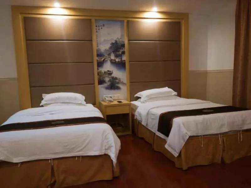 Bed in GreenTree Inn AnHui HuangShan She County HuiZhou Ancient City Middle HuangShan Road Business Hotel