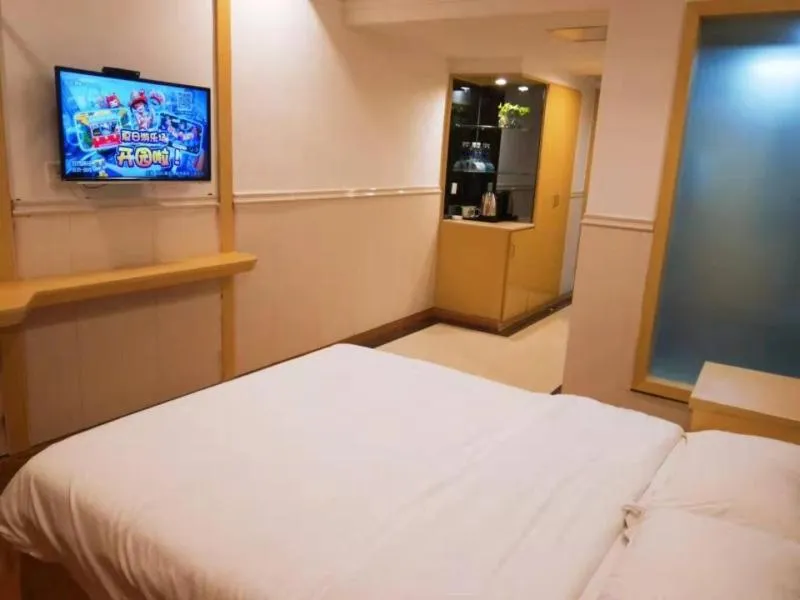 Bed in GreenTree Inn AnHui HuangShan She County HuiZhou Ancient City Middle HuangShan Road Business Hotel