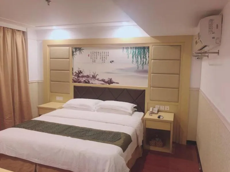 Bed in GreenTree Inn AnHui HuangShan She County HuiZhou Ancient City Middle HuangShan Road Business Hotel