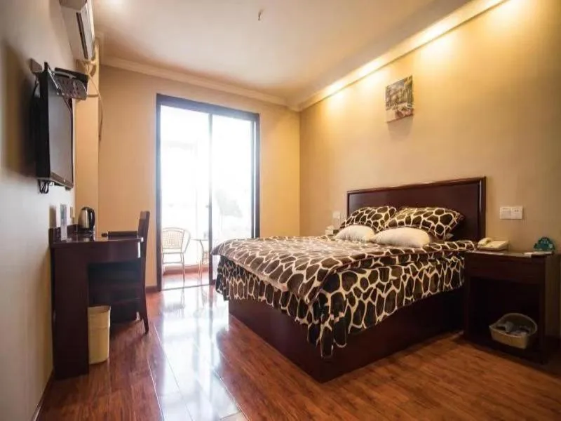 Bed in GreenTree Inn JiangSu WuXi DongTing Leather City Express Hotel