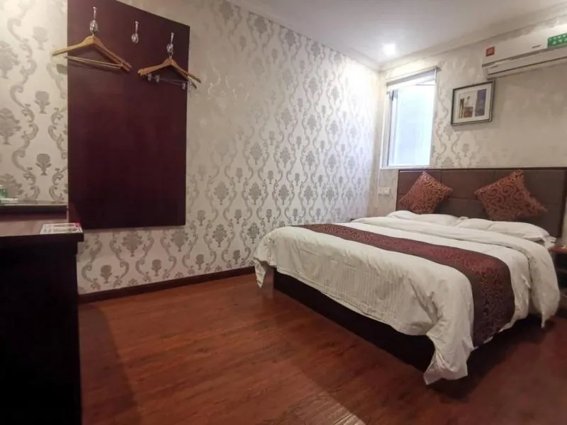 Bed in GreenTree Inn JiangSu WuXi BaShi HuaXiaQingCheng XiGang Road Shell Hotel