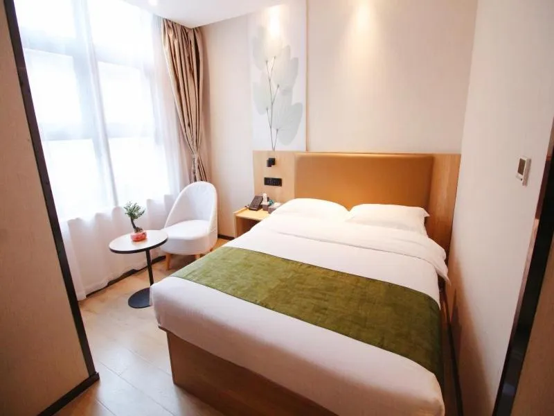 Bed in GreenTree Inn JiangSu SuZhou Industrial Park QingJian Lake Express Hotel