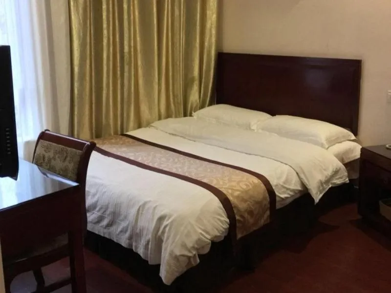 Bed in GreenTree Inn Jiangsu Suzhou International Education Zone Shihu Express Hotel