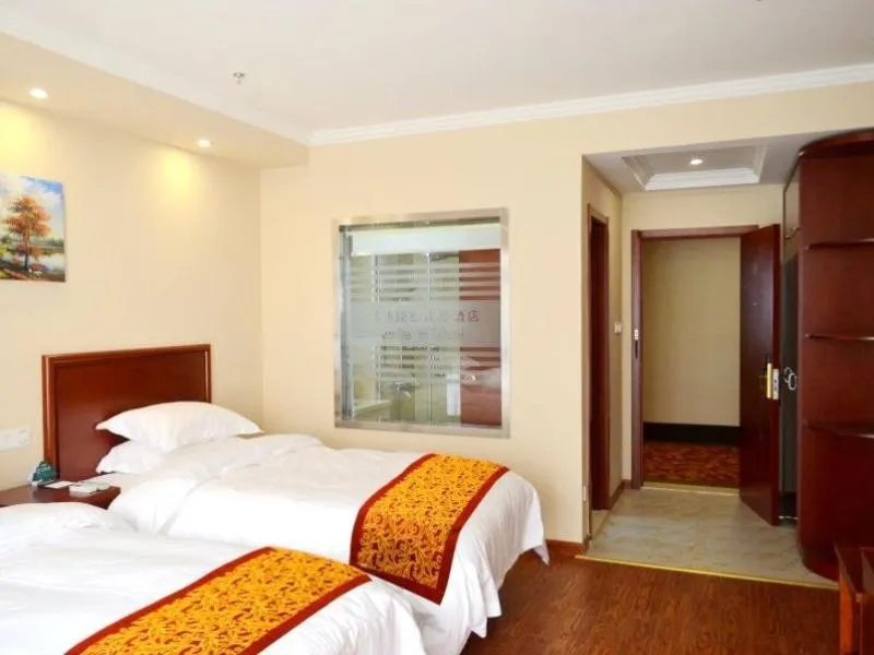 Bed in GreenTree Inn JiangSu NanTong BaiDian Town XiuShuiYuan Express Hotel