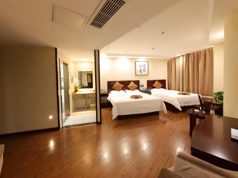 Bed in GreenTree Inn JiangSu HuaiAn University Town Science and Technology Avenue Business Hotel