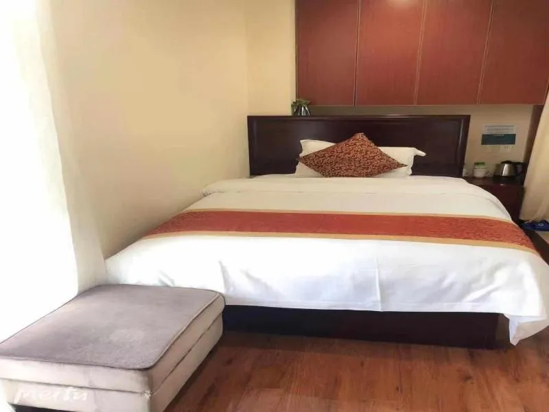 Bed in GreenTree Inn JiangSu HuaiAn University Town Science and Technology Avenue Business Hotel