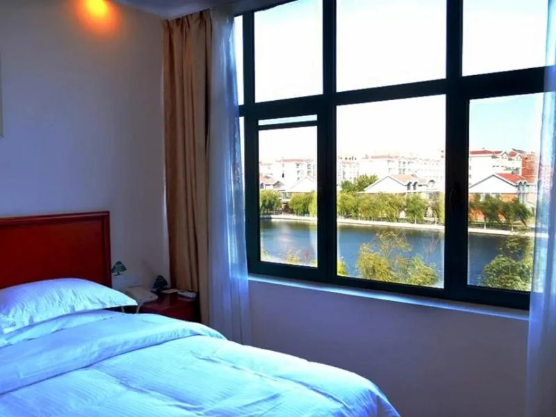 Bed in GreenTree Inn Shandong Qingdao Jiaozhou Bus Terminal Station Hai'er Avenue Express Hotel