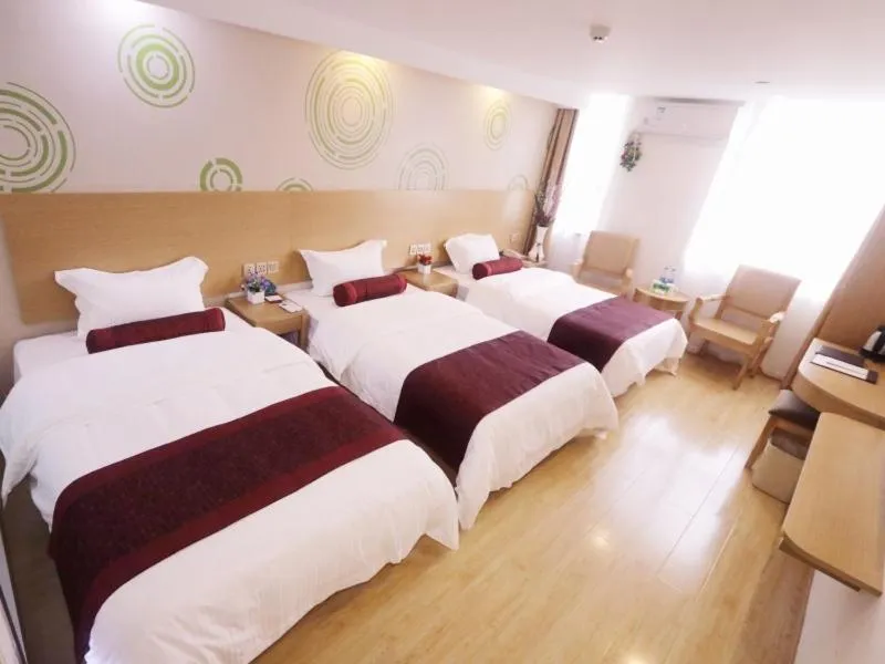 Bed in GreenTree Inn ZheJiang JiaXing West ZhongShan Road Vintage Car Building Express Hotel