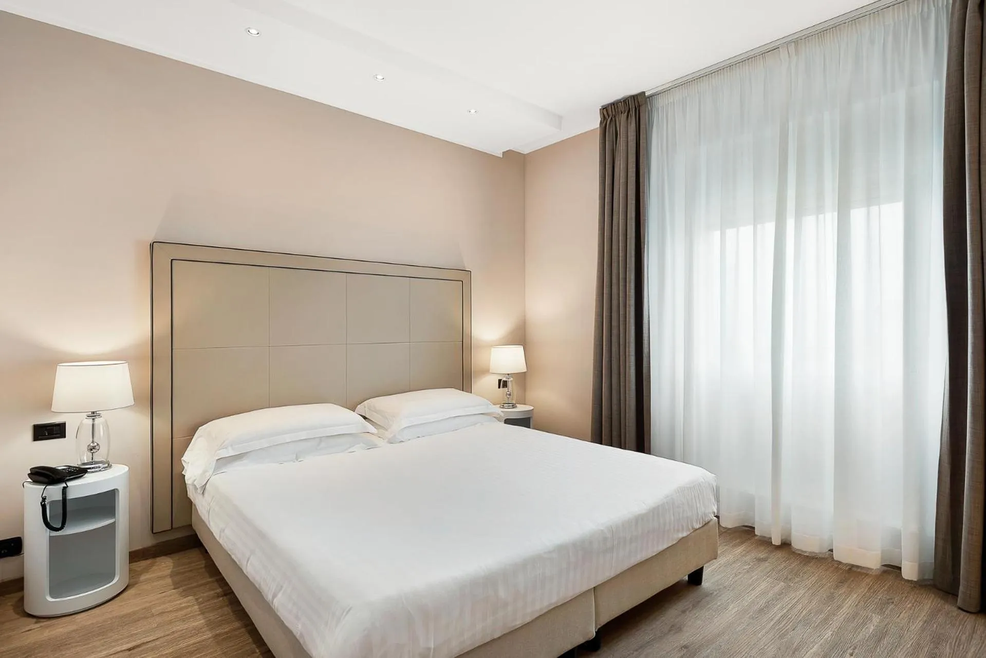 Bed in Hotel Excelsior