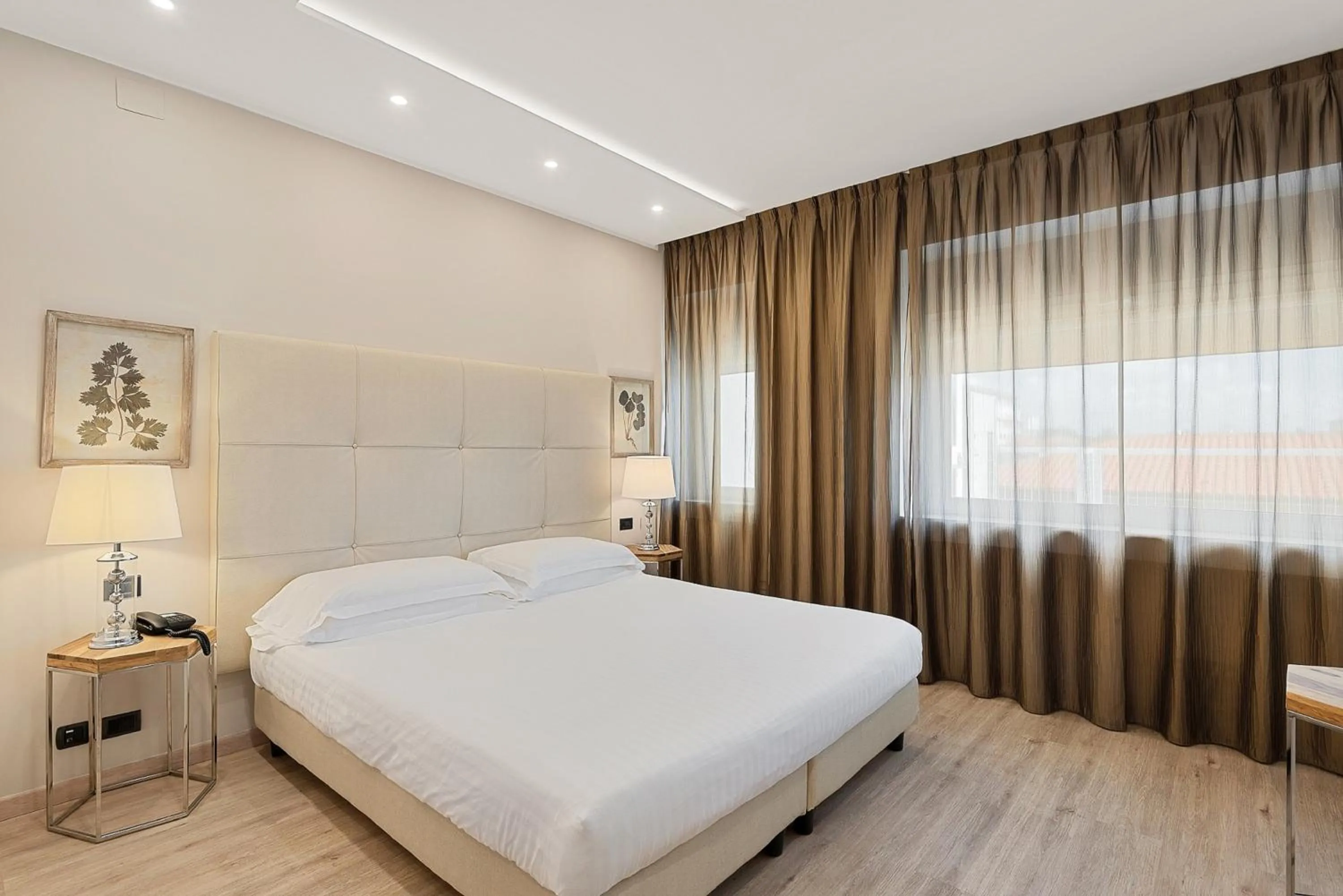 Bed in Hotel Excelsior