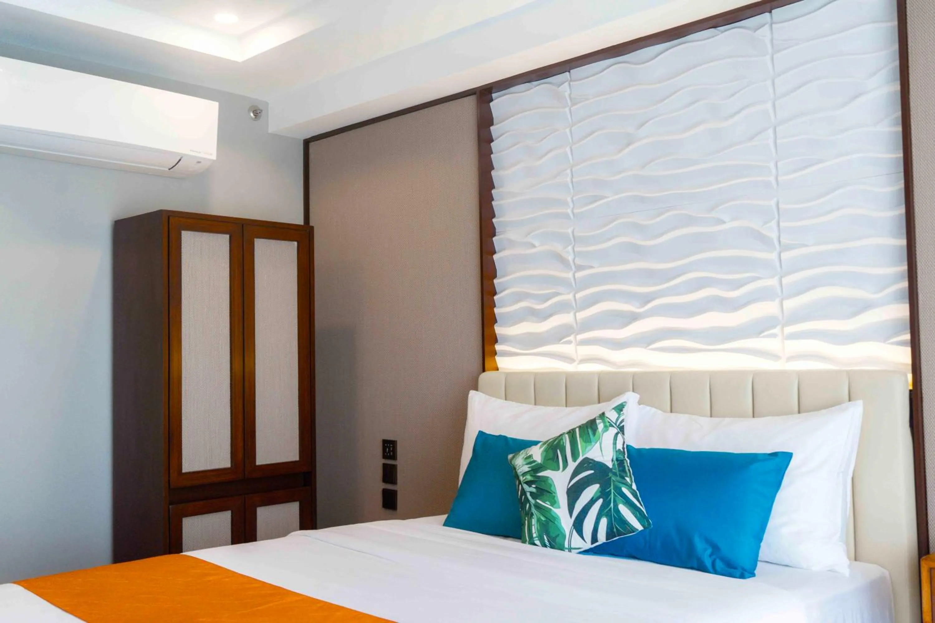 Bed in Puerto de San Juan Beach Resort Hotel and Residences