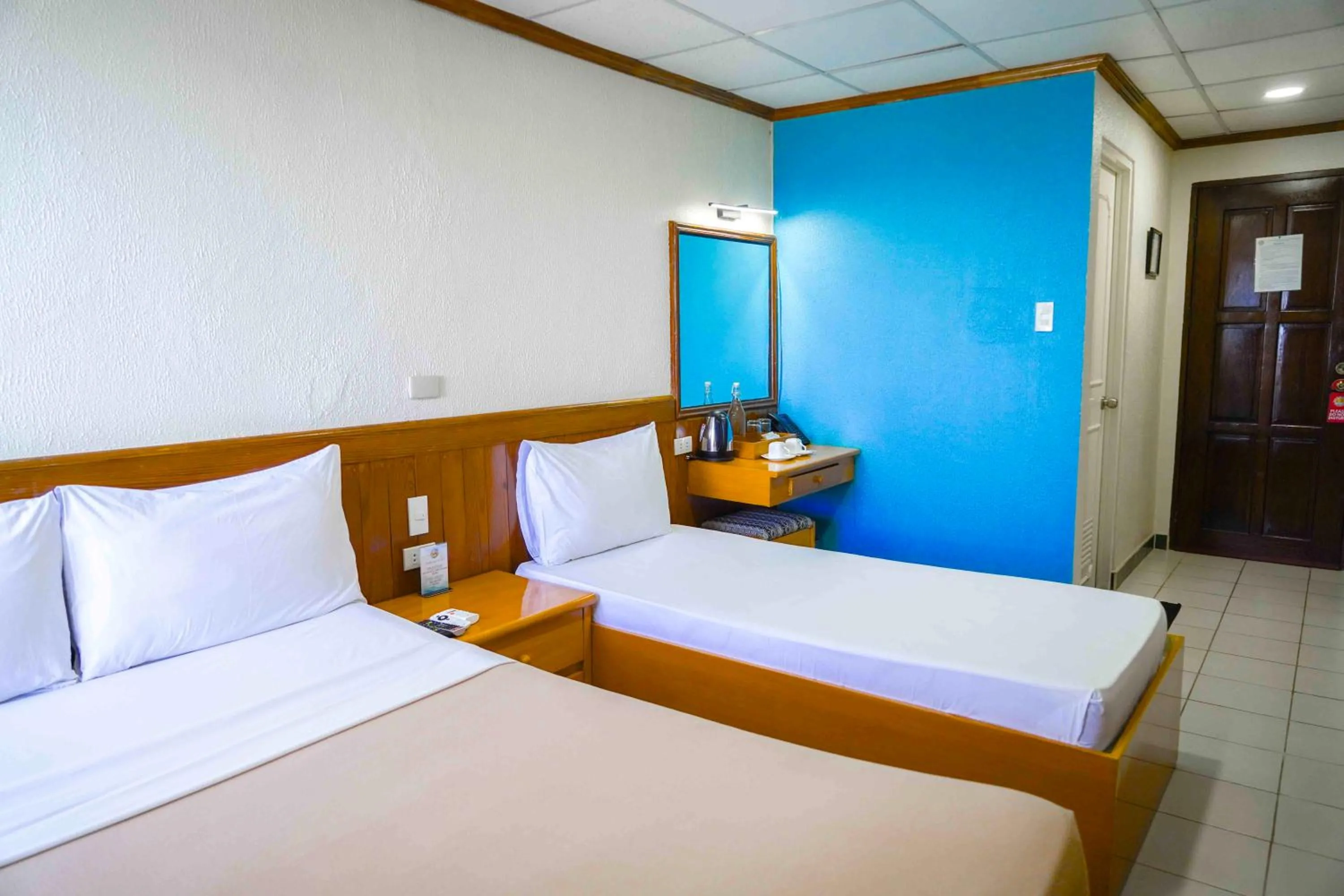 Bed in Puerto de San Juan Beach Resort Hotel and Residences