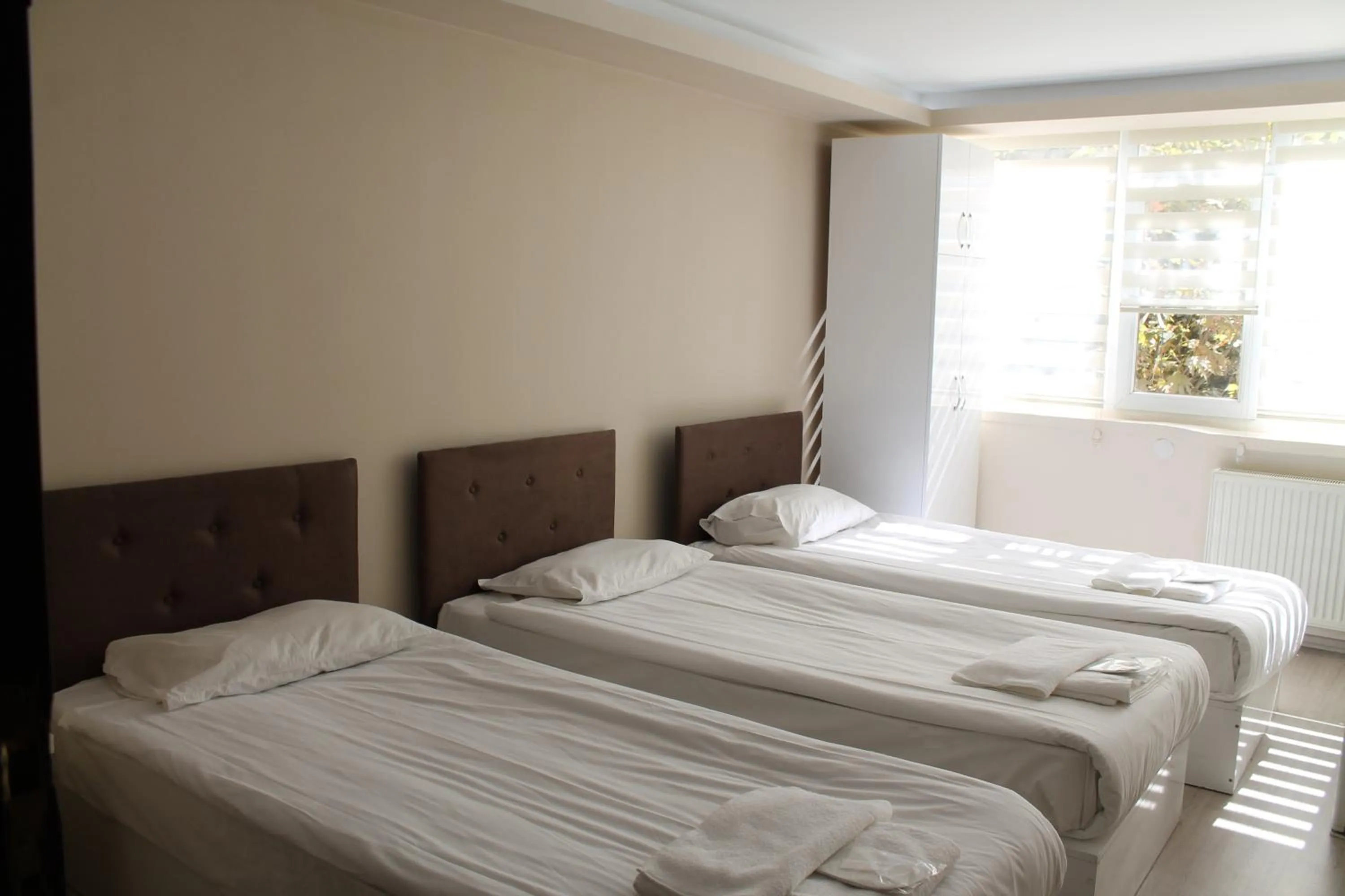 Bed in Hotel Abro Necatibey