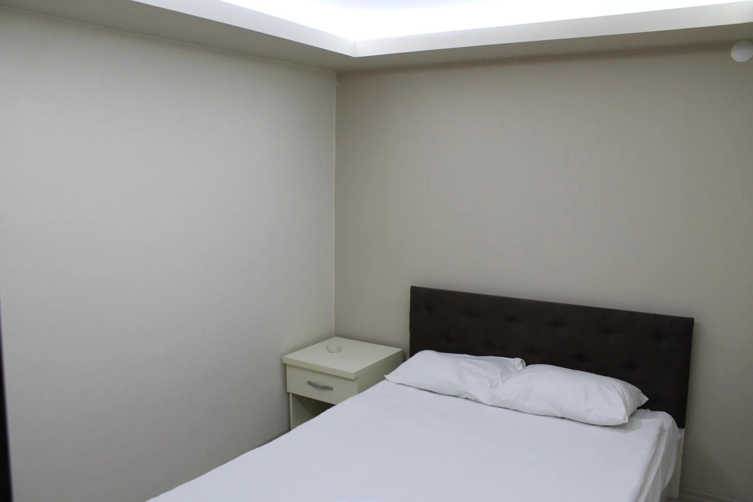 Bed in Hotel Abro Necatibey