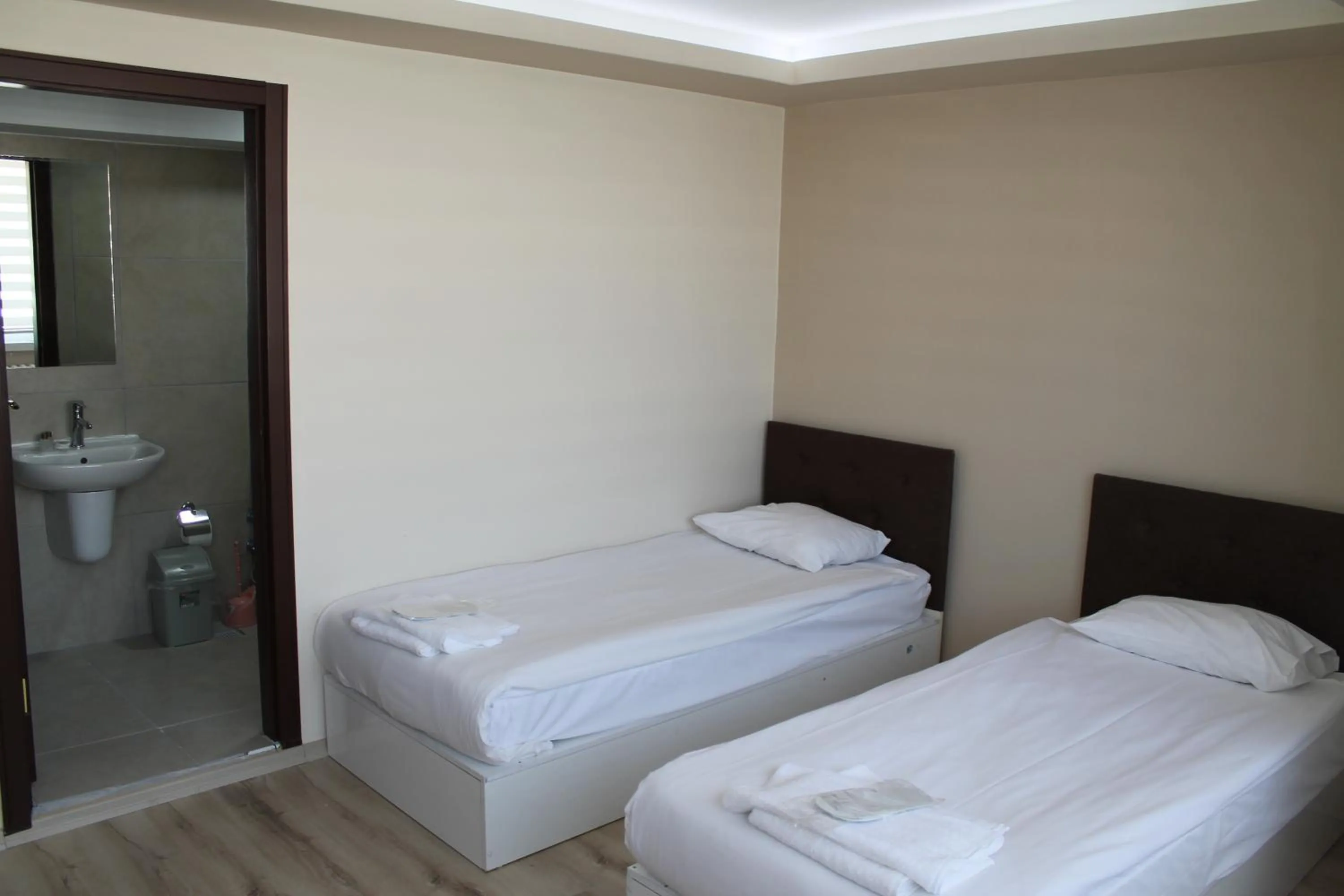 Bed in Hotel Abro Necatibey