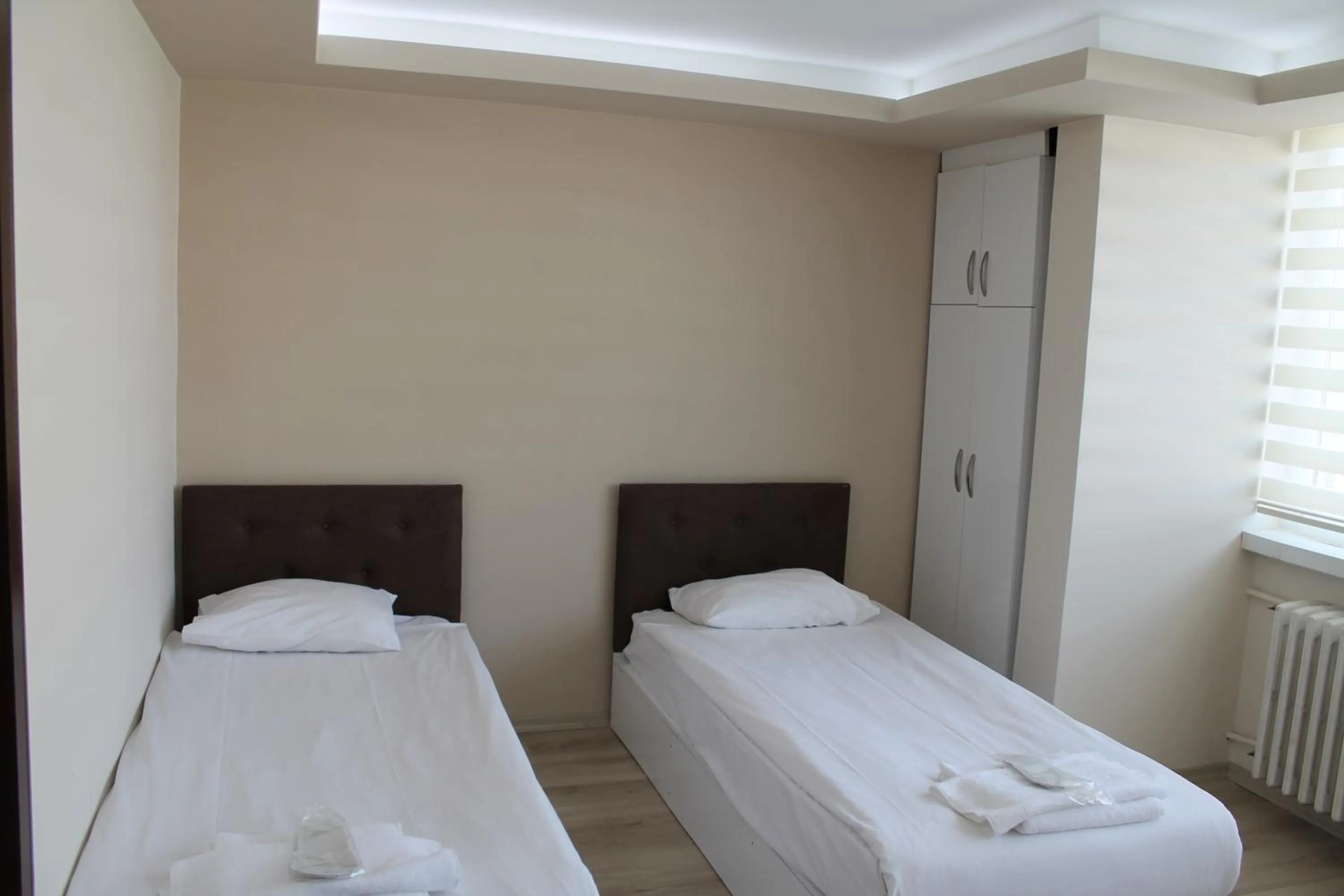 Bed in Hotel Abro Necatibey