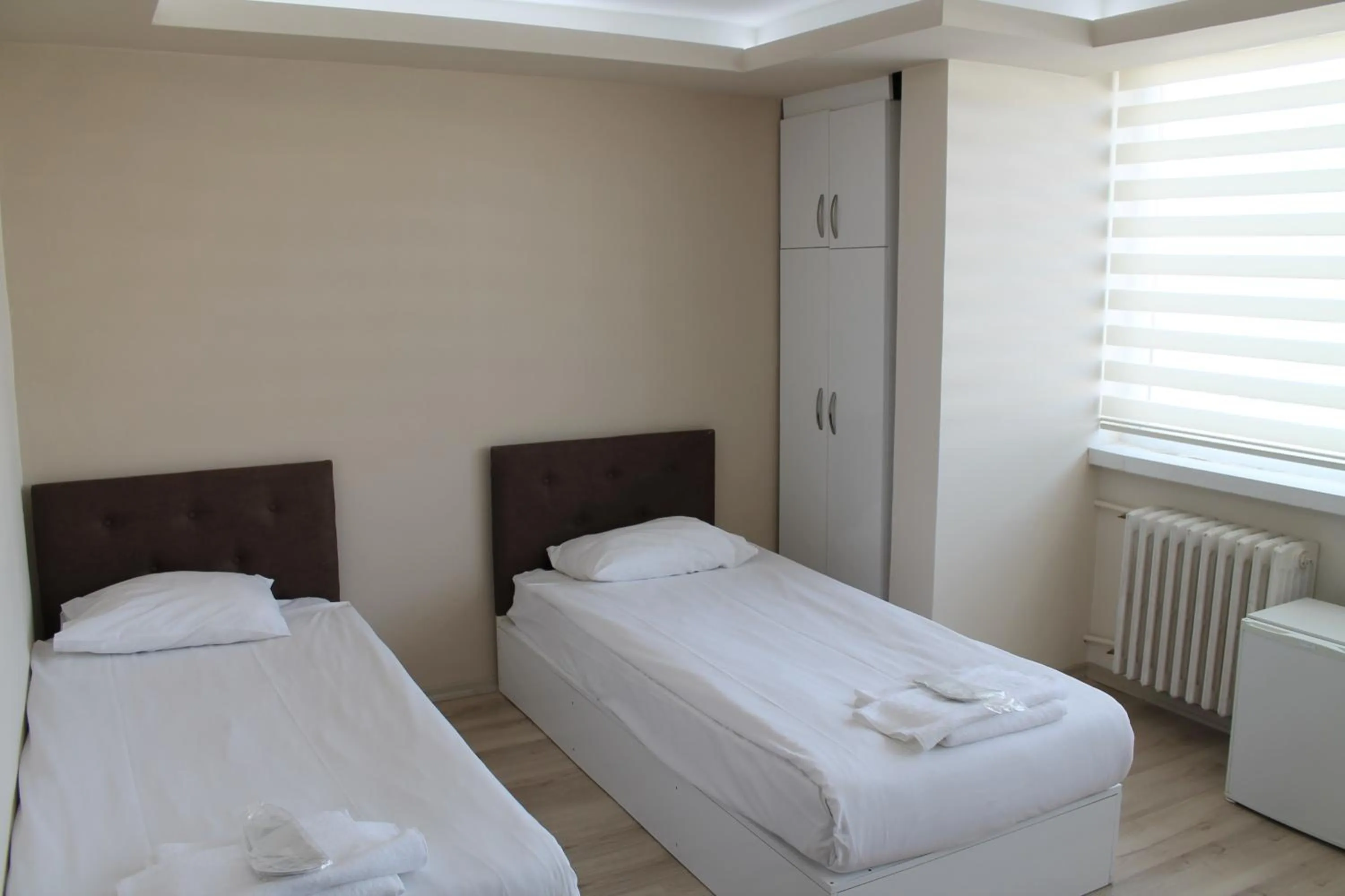 Bed in Hotel Abro Necatibey