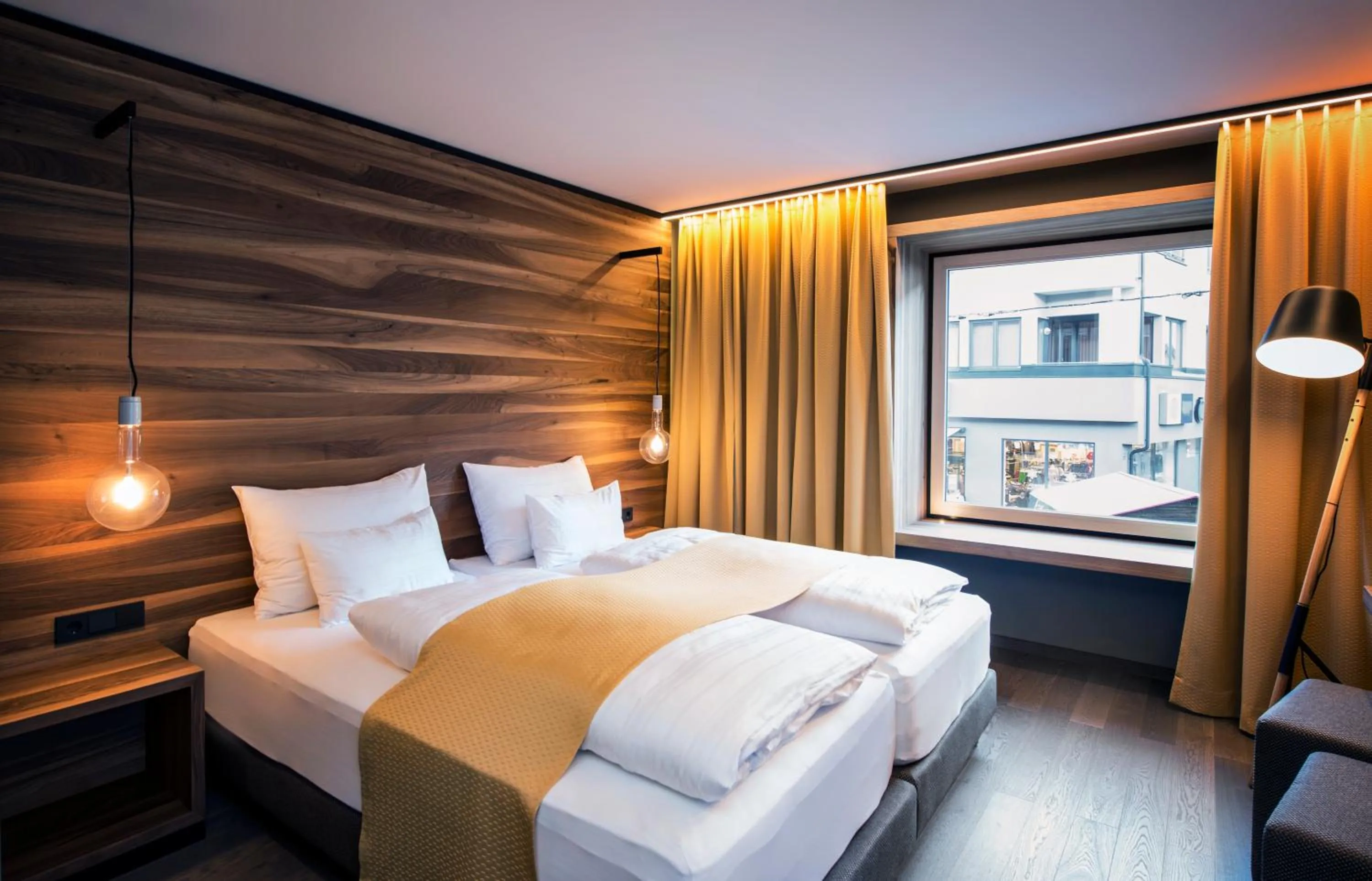 Bed in Stadthotel Brunner