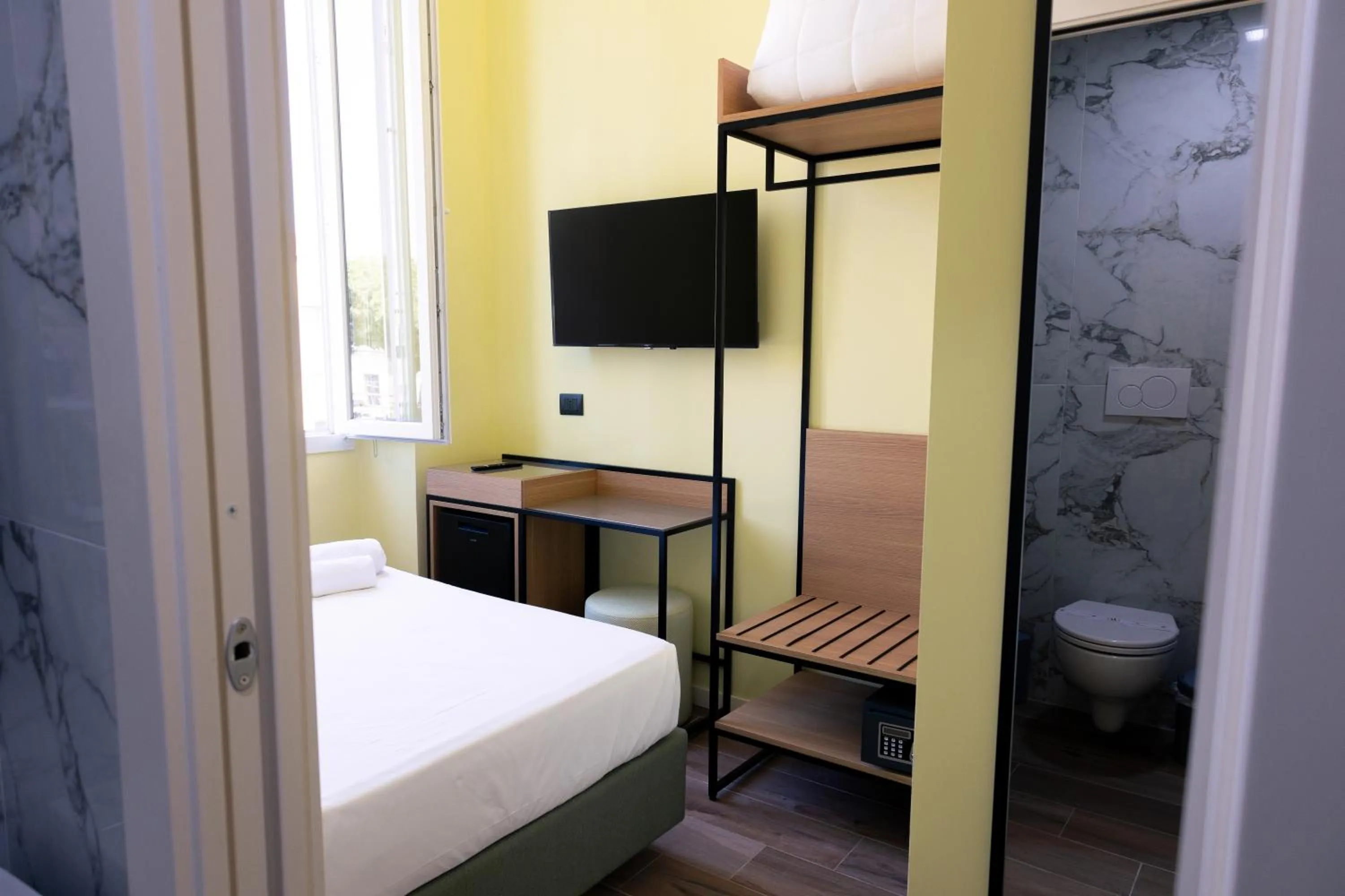 Photo of the whole room, Bed in JR Hotels Hermes Firenze