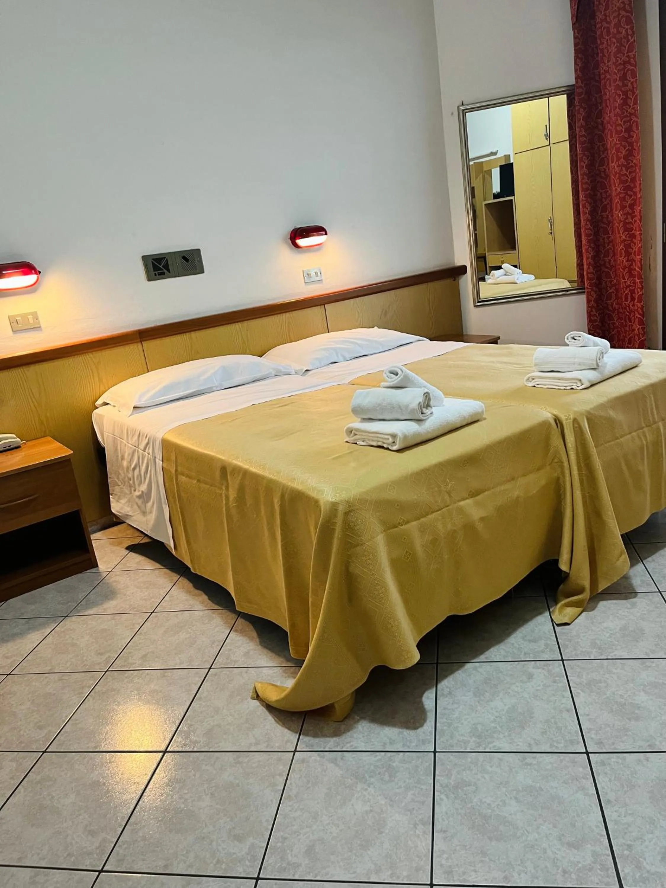 Bed in Hotel Columbia Frontemare