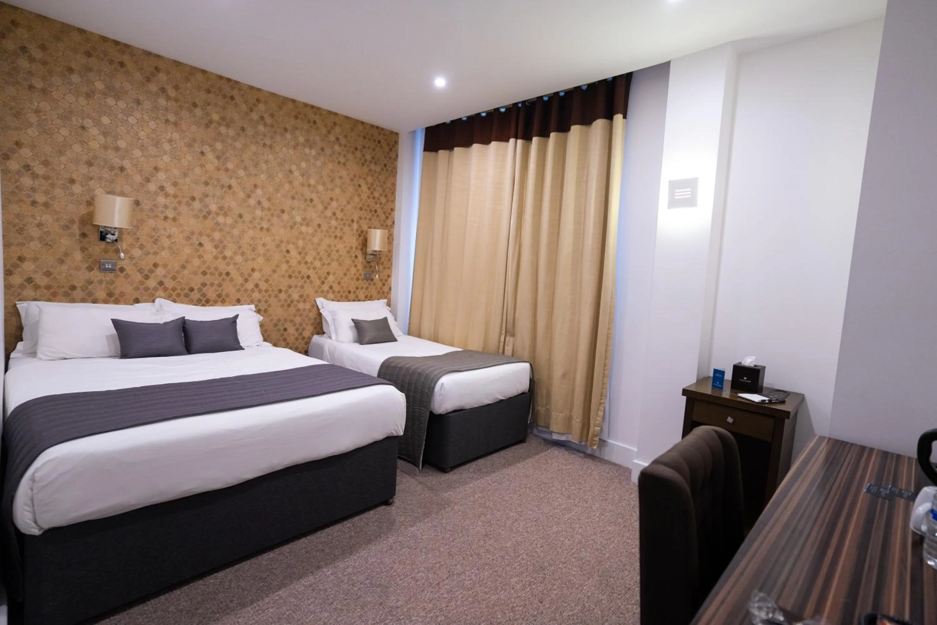 Bed in Grand Sapphire Hotel & Banqueting