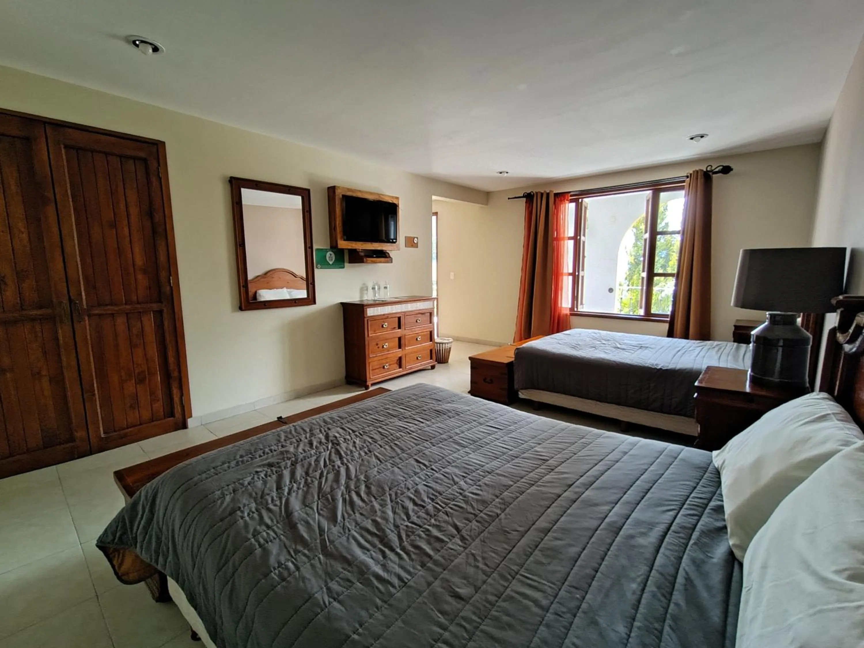 Bed in HOTEL XIADANI Restaurante, Temazcal & Spa