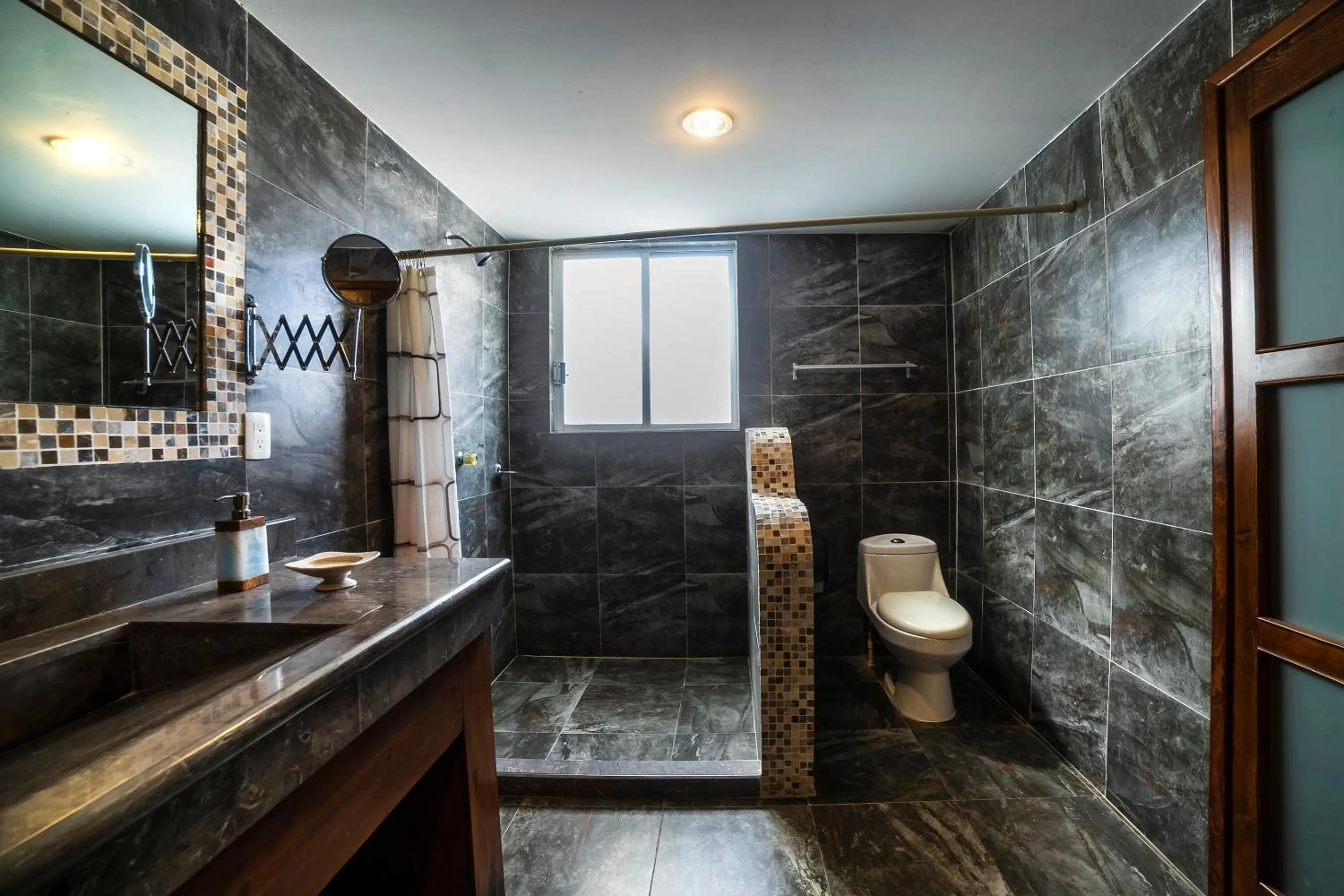 Bedroom in HOTEL XIADANI Restaurante, Temazcal & Spa