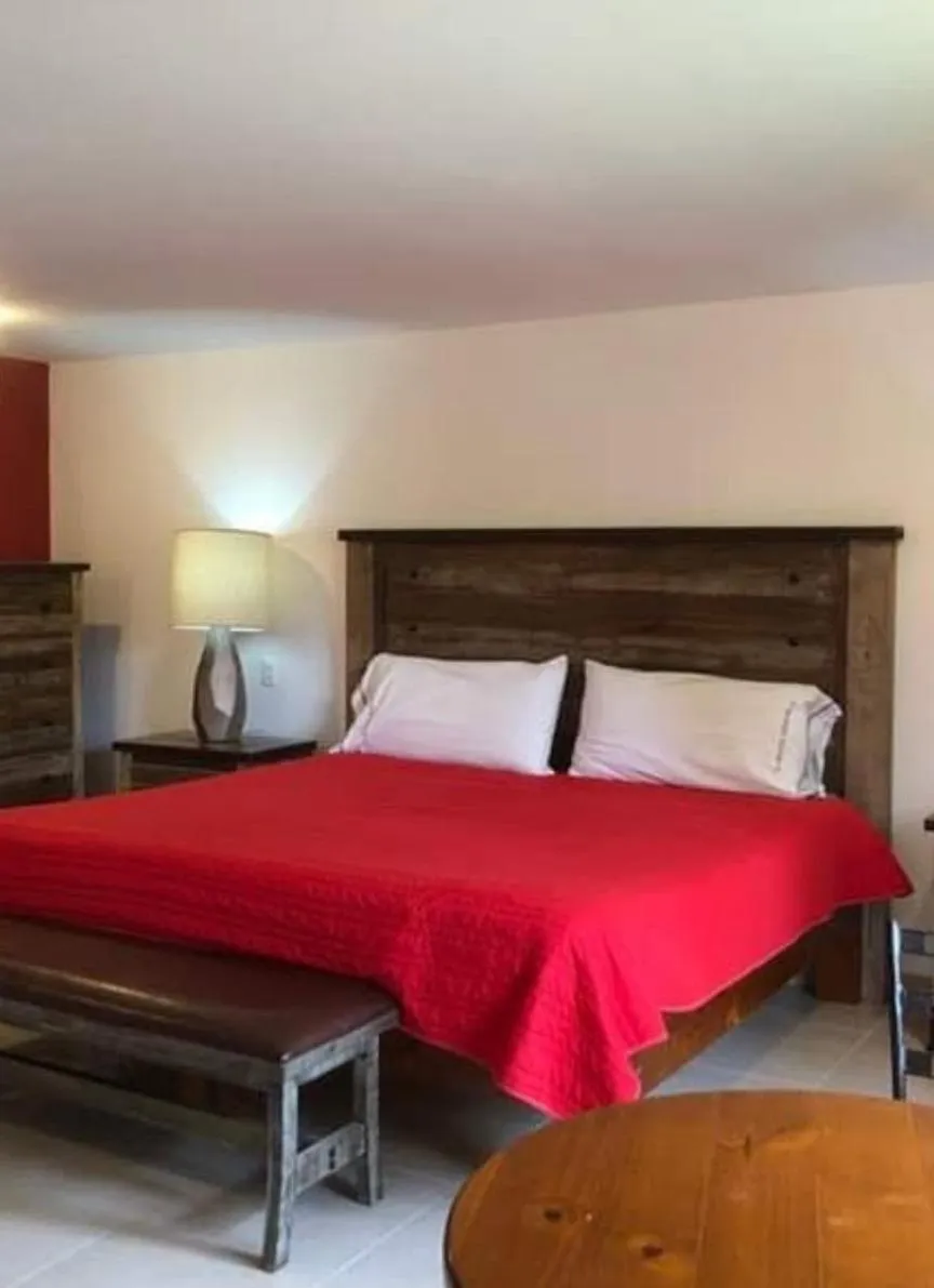 Bed in HOTEL XIADANI Restaurante, Temazcal & Spa