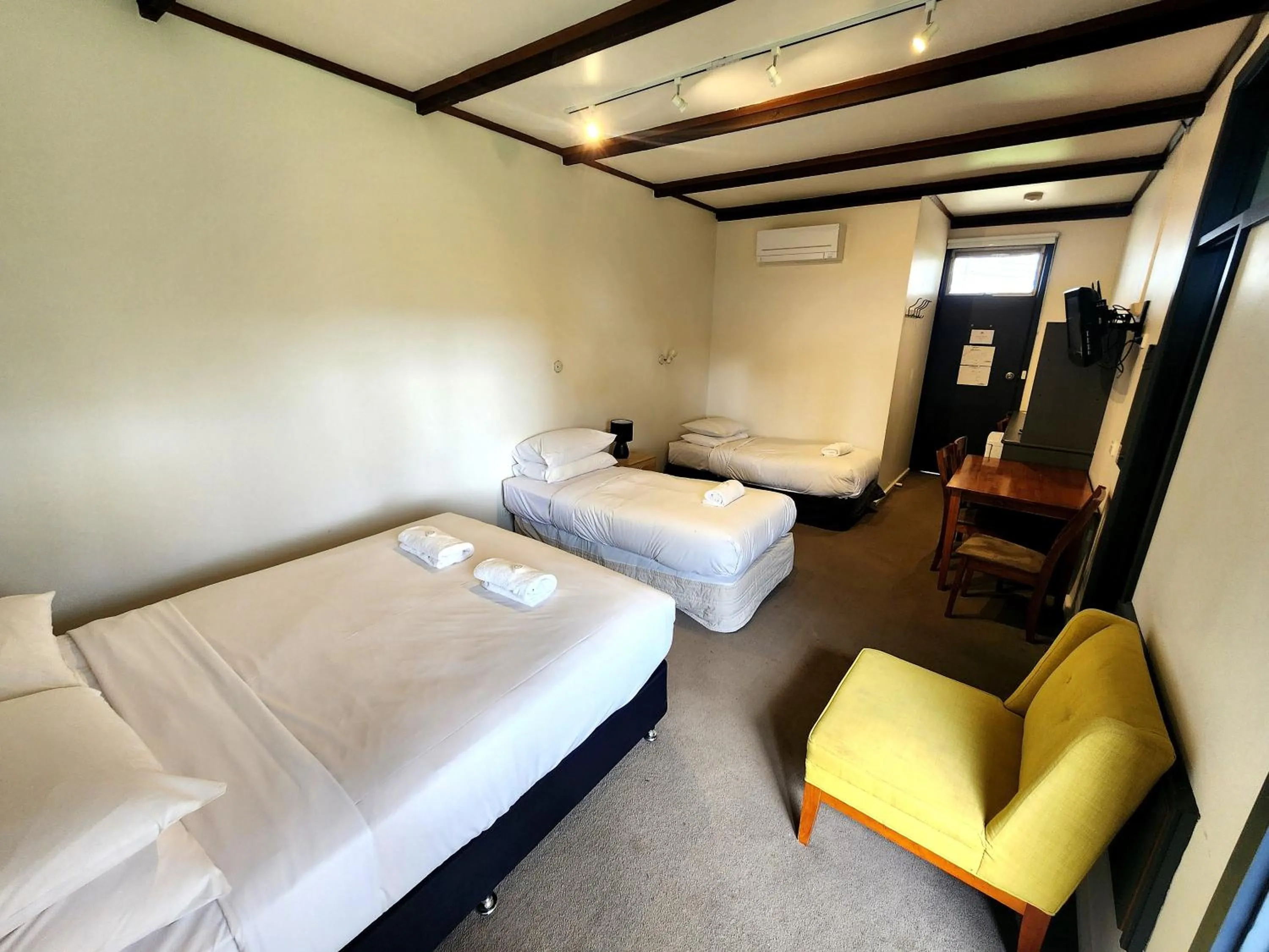 Photo of the whole room, Bed in Fish Creek Hotel