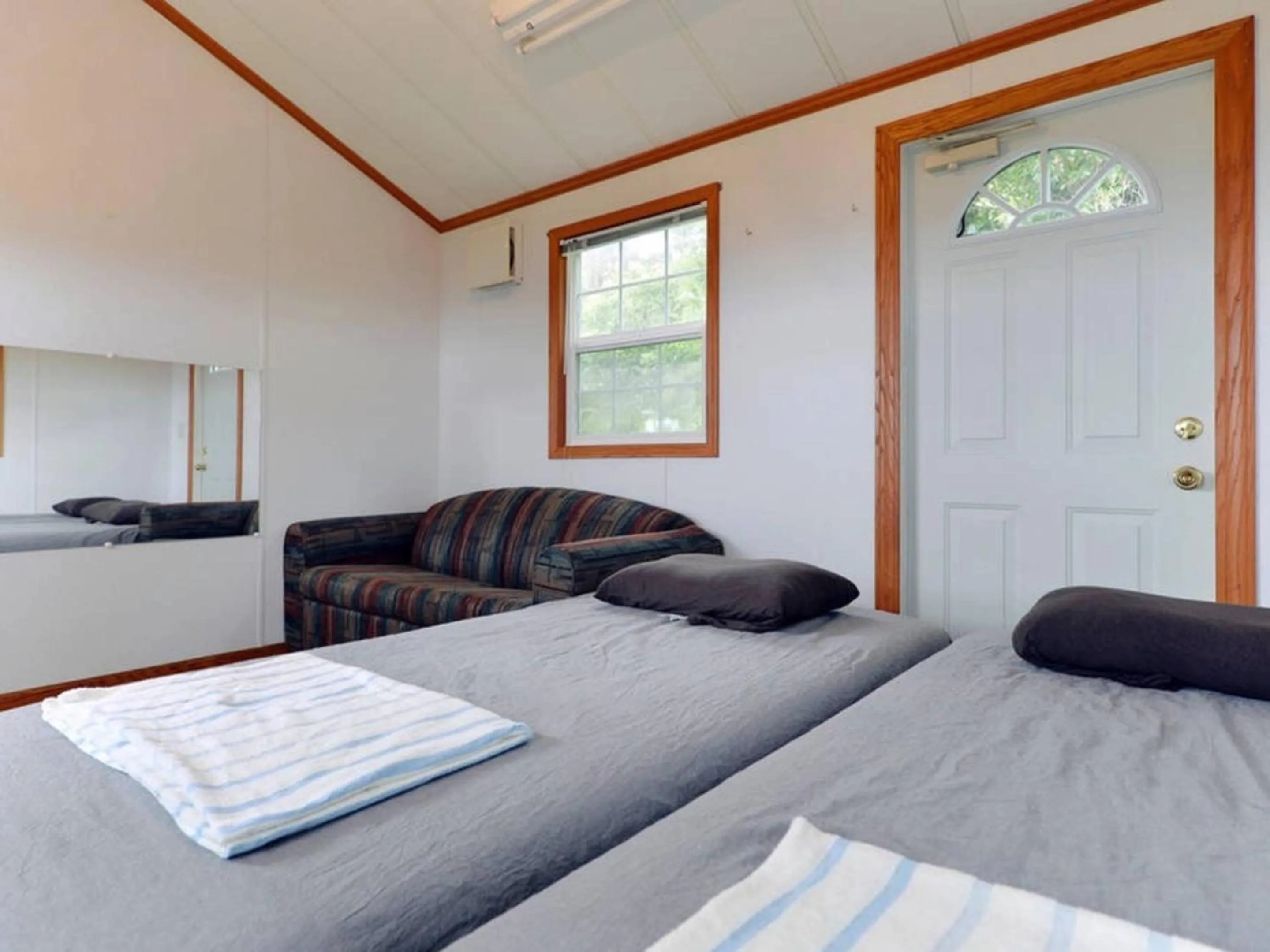 Photo of the whole room, Bed in PANORAMA Ocean View Cottage